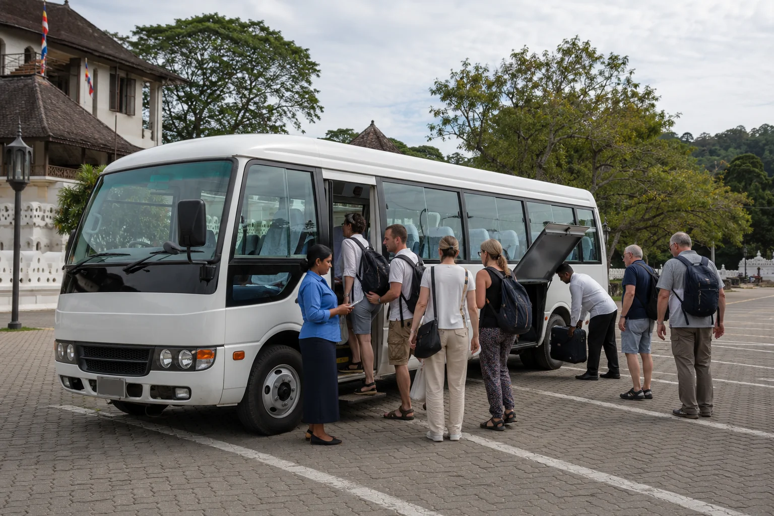 Guests boarding a Wavion Lanka coaster bus
